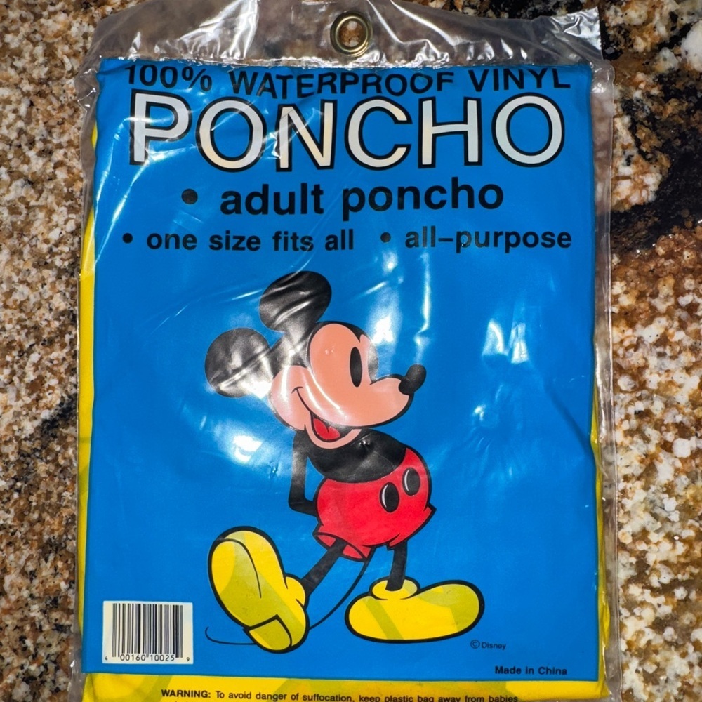 Vintage Disney Blue and Yellow Poncho with Iconic Character